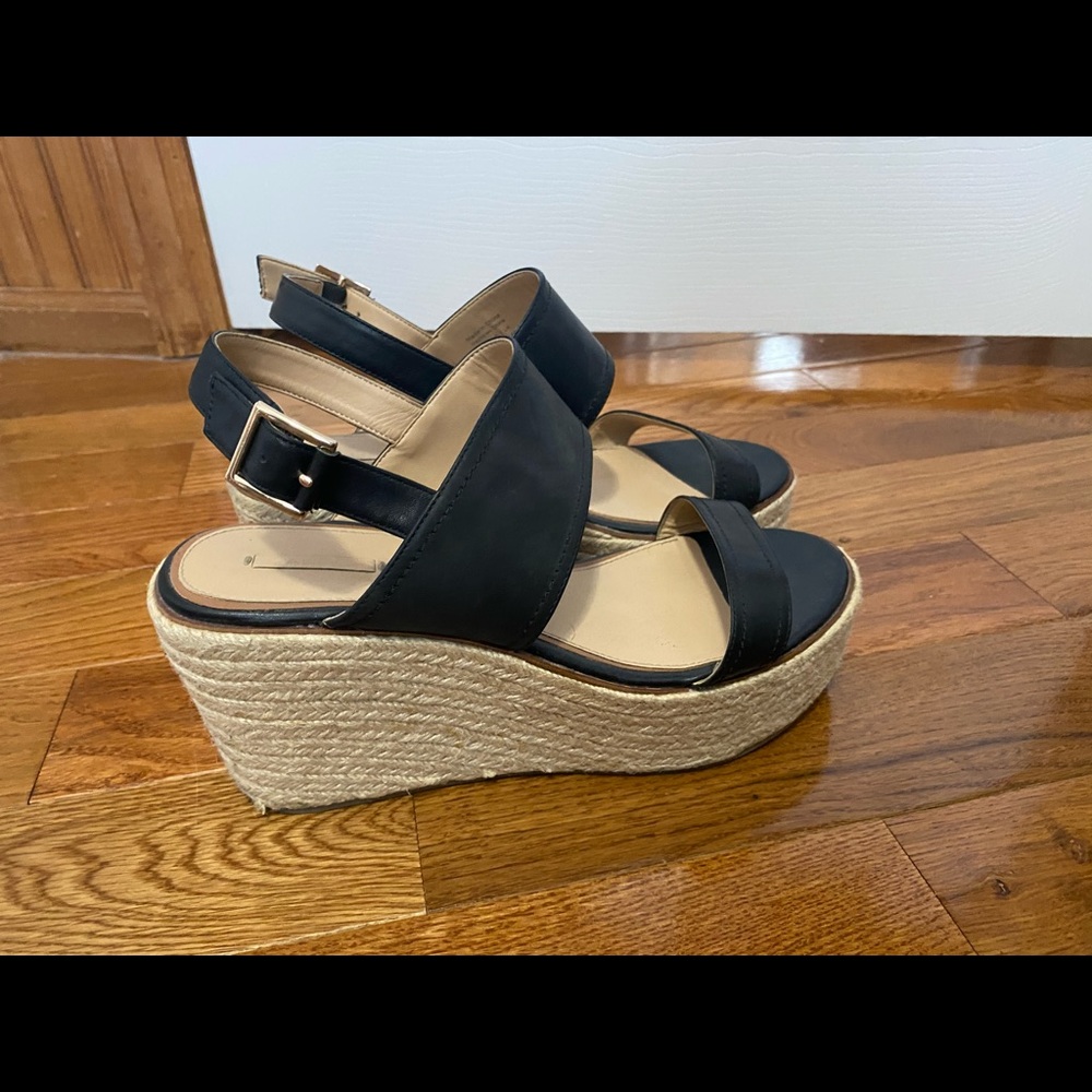 Lightly worn black wedge sandals